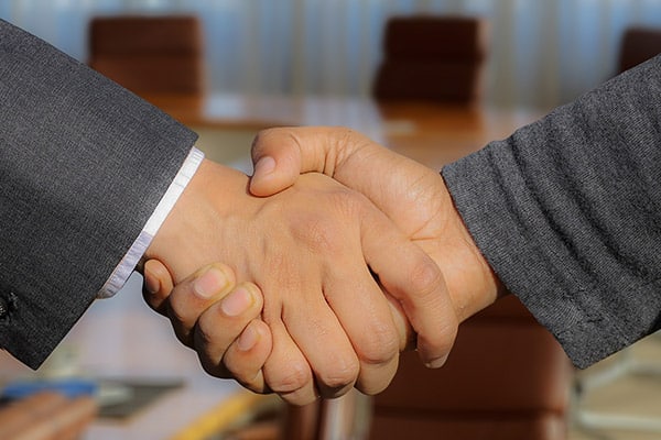 Shaking Hands - Property Purchase - Canadian Pioneer Estates