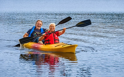 Exploring MacInnis Lake Estates via Tandem Kayak 