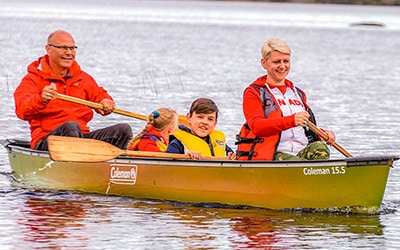 Family explores Seven Peninsula Estates via Canoe from Private Acres and Islands